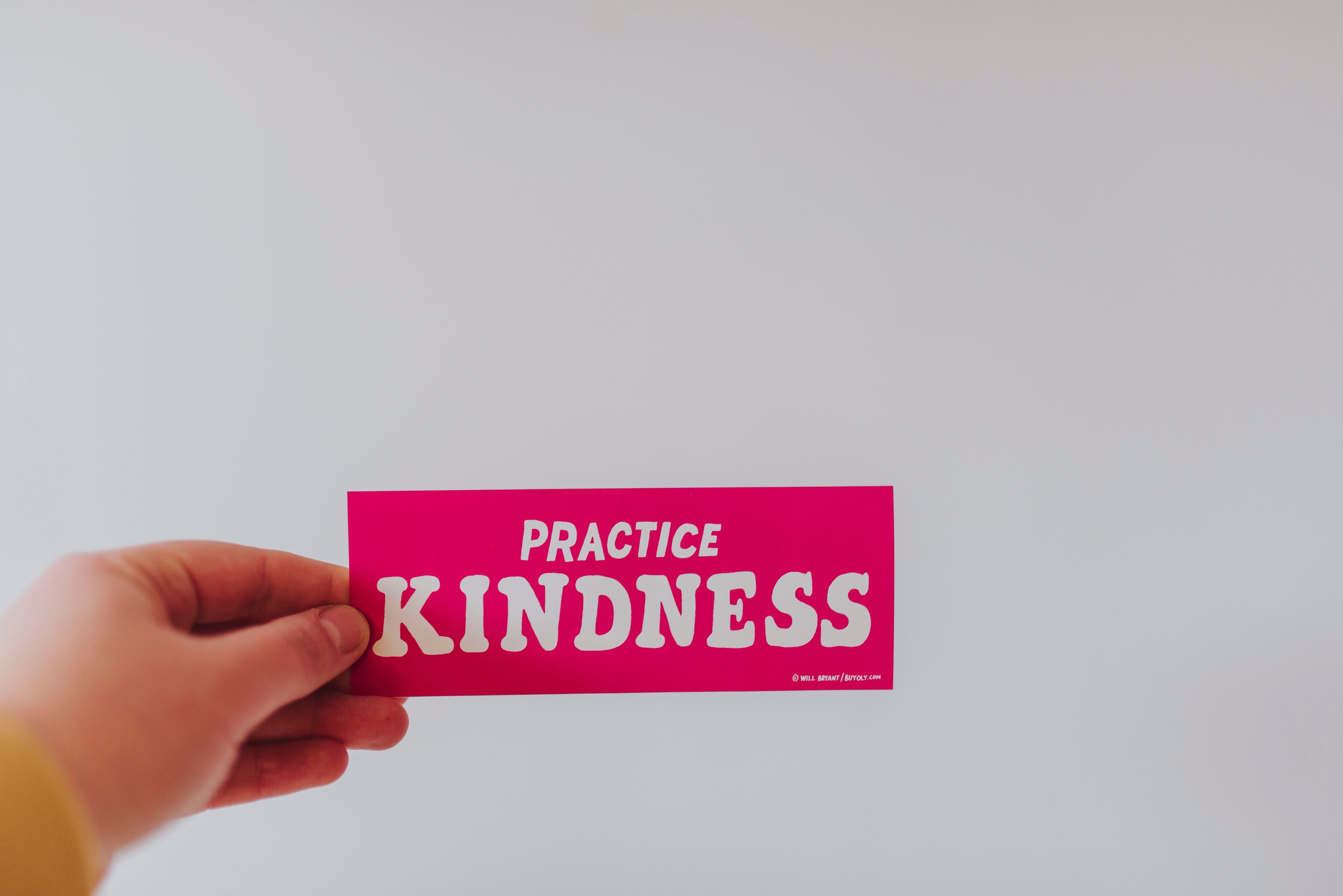 had holding note saying practice kindness